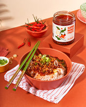 Load image into Gallery viewer, The finisher! Cook your favourite foods as you usually would and add a healthy spoon of Chili Crisp to the finished product. Rice, noodles, eggs, and pasta dishes will never be the same!