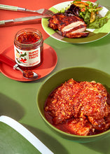 Load image into Gallery viewer, The ultimate marinade! Start with your favourite marinade and add a dollop of Chili Crisp to take things to a magical new dimension. Our favourite is soy, mirin, honey, and Chili Crisp on chicken, paneer, or tofu.