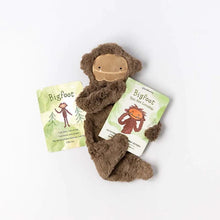 Load image into Gallery viewer, With the book and the affirmation, the Bigfoot snuggler helps build a foundation of security, safety, and connection. This soft, cuddly lovey promotes valuable life skills, builds self-esteem, and is a daily reminder that little ones are unique, strong, and wonderful just as they are.

