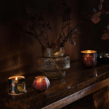 Load image into Gallery viewer, Midnight Pumpkin Radiant Glass Candle, Small