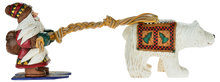 Load image into Gallery viewer, Cottage Carvings -Skiing Santa with Polar Bear - Canadian Artist Dave Francis
